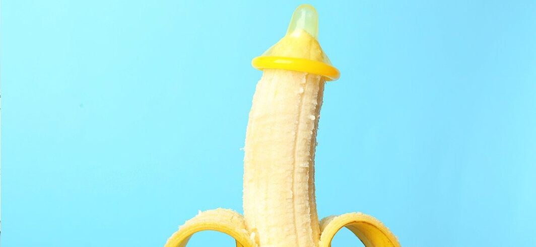 Banana in a condom as an imitation of a penis enlargement without surgery